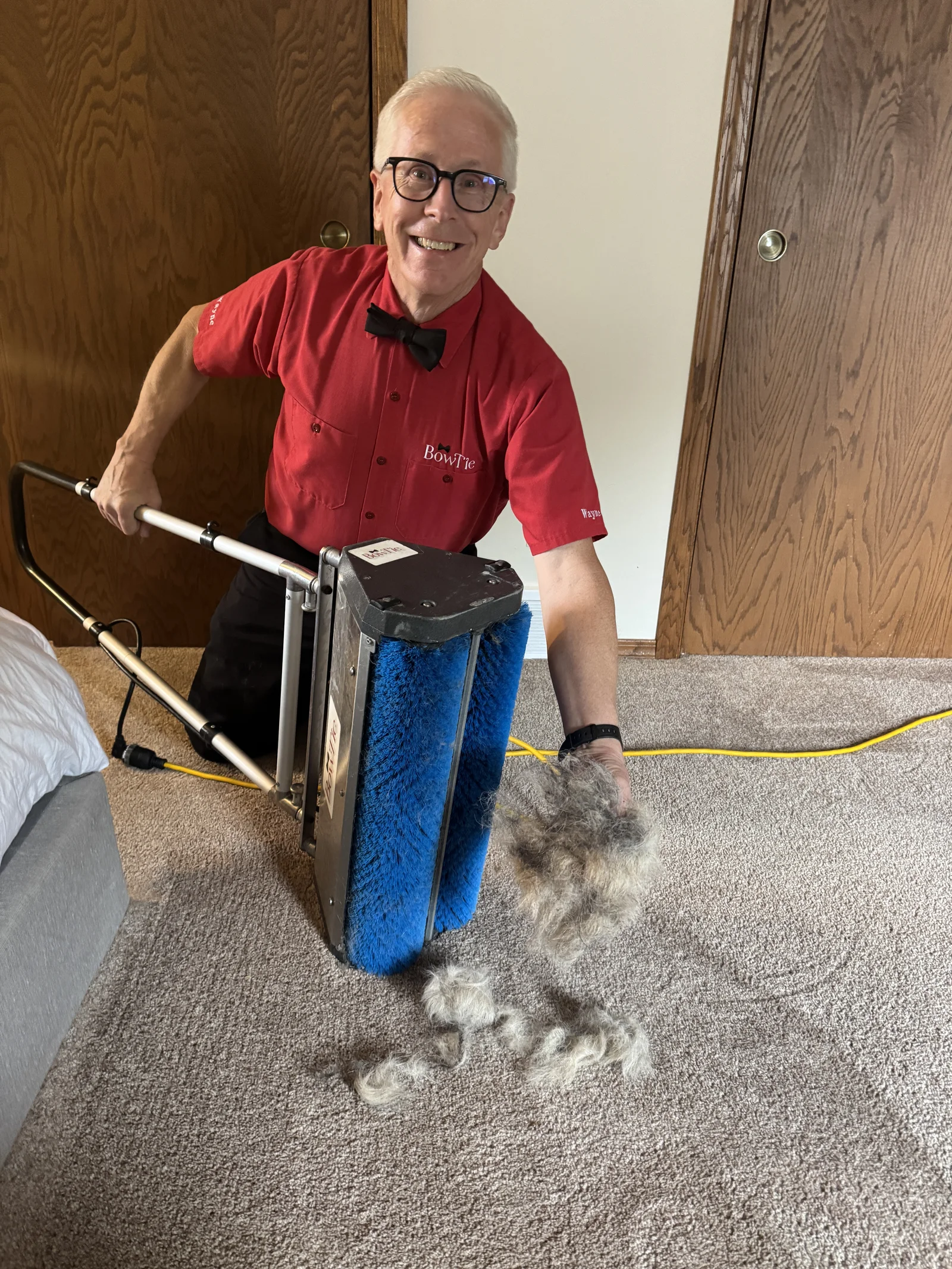 Wayne, owner of BowTie Cleaning, at work